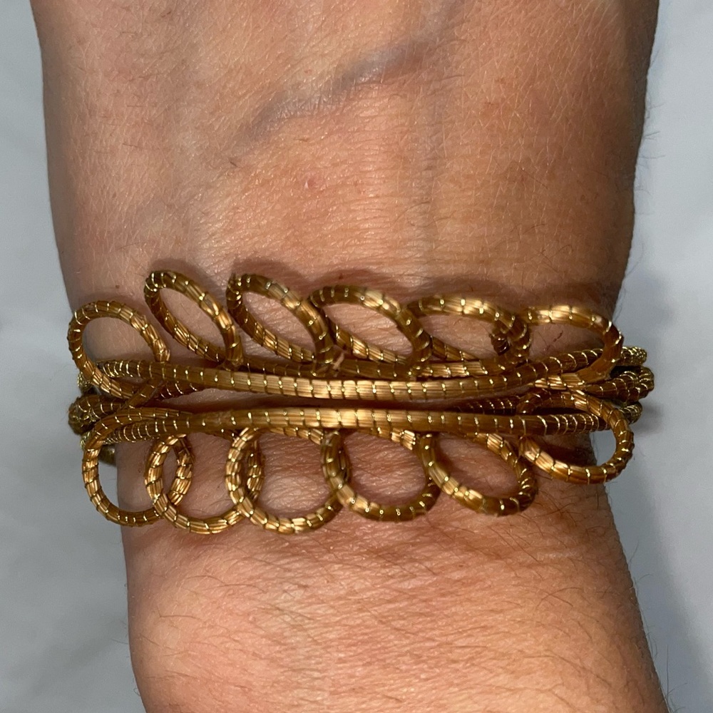 Beautiful golden bracelet from Brazil. Made with golden natural fiber